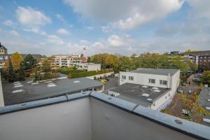 a view of a city from the roof of a building at Downtown Apartments Unterbilk in Düsseldorf