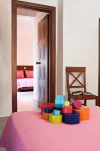 Ένα ή περισσότερα κρεβάτια σε δωμάτιο στο Stratos Hotel 