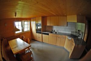 Kuchyň nebo kuchyňský kout v ubytování Ferienhaus Brand