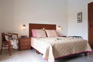Ένα ή περισσότερα κρεβάτια σε δωμάτιο στο Stratos Hotel 