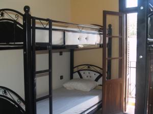 Uma cama ou camas num quarto em TanjaLucia Hostel