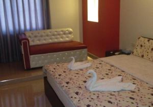 Ajnadeen Hotel客房内的一张或多张床位