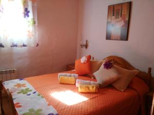Postel nebo postele na pokoji v ubytování Chalet Ruta Las Lagunetas + 37 fotografií