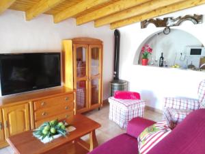 TV a/nebo společenská místnost v ubytování Chalet Ruta Las Lagunetas