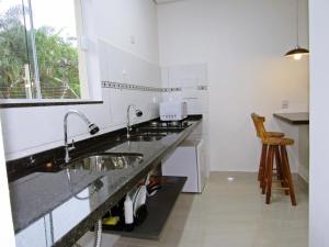 Virtuve vai virtuves zona naktsmītnē Pousada do Pinheiro