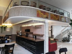 Cucina o angolo cottura di Hotel Montecarlo Santiago