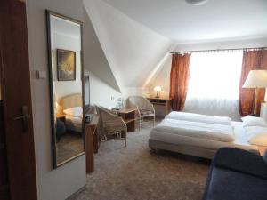 Łóżko lub łóżka w pokoju w obiekcie Hotel Górecki