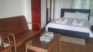 Postel nebo postele na pokoji v ubytování Thipburee Resort