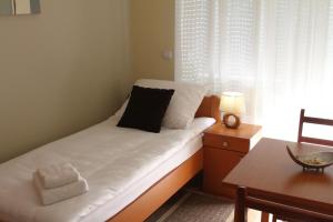 Ліжко або ліжка в номері Rooms Villa Aria