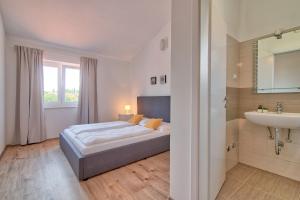 Postel nebo postele na pokoji v ubytování Villa Blaise