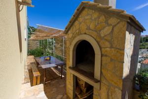 Ein Balkon oder eine Terrasse in der Unterkunft Apartments Sunset Dolac
