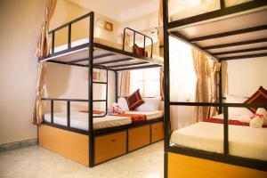 Voodi või voodid majutusasutuse Hanoi City Backpackers Hostel toas