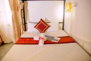 Voodi või voodid majutusasutuse Hanoi City Backpackers Hostel toas