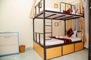 Voodi või voodid majutusasutuse Hanoi City Backpackers Hostel toas