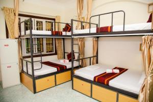 Voodi või voodid majutusasutuse Hanoi City Backpackers Hostel toas