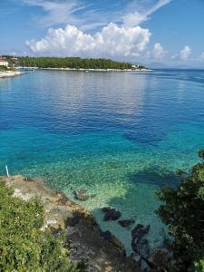 a view of a large body of water at Stella Hotel Apartments in Fiskardo
