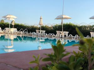 Bazén v ubytování Residence Hotel Antica Perla nebo v jeho okolí