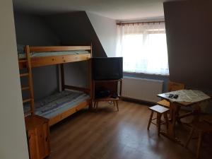 Posteľ alebo postele v izbe v ubytovaní Dom gościnny Krasne