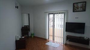 TV a/nebo společenská místnost v ubytování Hotel Mill Road + 17 fotografií