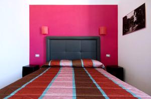 Postel nebo postele na pokoji v ubytování MF Hotel