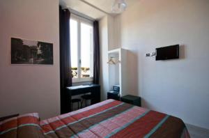 TV a/nebo společenská místnost v ubytování MF Hotel + 30 fotografií