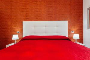 A bed or beds in a room at Vista Mare B&B