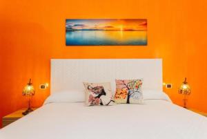 A bed or beds in a room at Vista Mare B&B