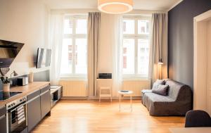 Kuchyň nebo kuchyňský kout v ubytování Schwerin City Apartment