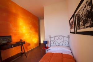 Posteľ alebo postele v izbe v ubytovaní B&B Le Lupe