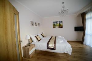Posteľ alebo postele v izbe v ubytovaní Diana Apartments Karlovy Vary