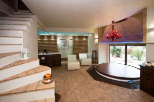 A seating area at AgriResort Spa Glamping Poggio Di Montedoro