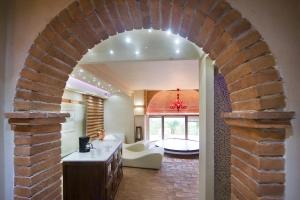 A bed or beds in a room at AgriResort Spa Glamping Poggio Di Montedoro
