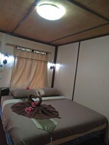 Ein Bett oder Betten in einem Zimmer der Unterkunft Phi Phi Green Hill Resort