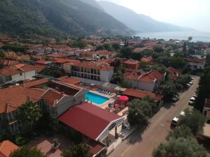 an aerial view of a town with a swimming pool at Taner Otel in Oludeniz