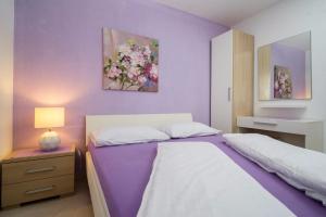 Postel nebo postele na pokoji v ubytování Apartments "Villa Antea" + 37 fotografií