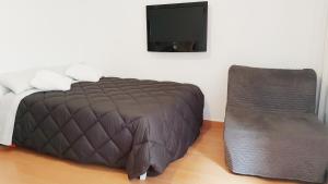 A bed or beds in a room at Alda Benalmadena Még 37 kép