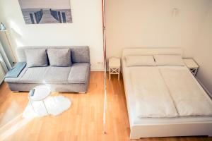 Postel nebo postele na pokoji v ubytování Schwerin City Apartment