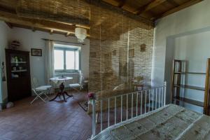 Postel nebo postele na pokoji v ubytování Agriturismo Specchio Del Lago