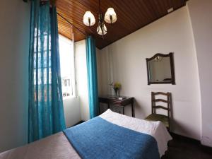 Postel nebo postele na pokoji v ubytování Hotel GORDON