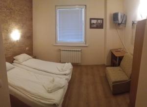 Postel nebo postele na pokoji v ubytování Comfort Guest House