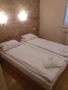 Postel nebo postele na pokoji v ubytování Comfort Guest House