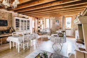 Reštaurácia alebo iné gastronomické zariadenie v ubytovaní B&B - Relais de charme la Caminella