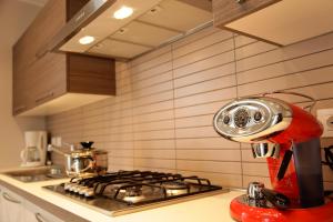 A kitchen or kitchenette at Villa Perla del Lago