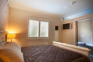 Postel nebo postele na pokoji v ubytování Sea Breeze Lodge B&B Galway