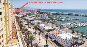 an aerial view of a marina with boats in the water at urbanización puerto paraiso in Estepona