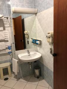 Vannituba majutusasutuses Hôtel Vesuvio