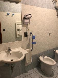 Vannituba majutusasutuses Hôtel Vesuvio
