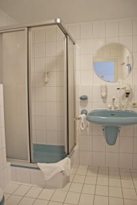 Een badkamer bij Fletcher Landhotel Bosrijk Roermond