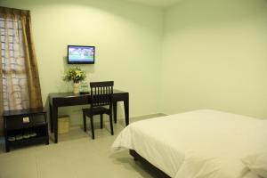 TV a/nebo společenská místnost v ubytování Hotel Rembia