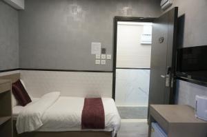Postelja oz. postelje v sobi nastanitve Vve Vve Hotel